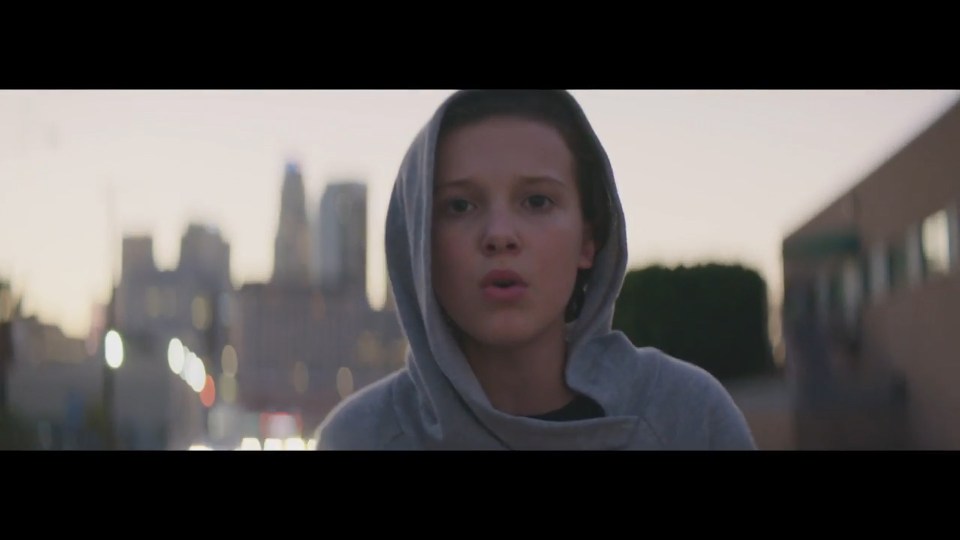 The video starts with Millie in the middle of a street at dawn 
