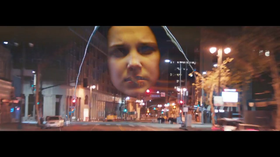 The clip has a sci-fi feel as the star whizzes through Los Angeles 