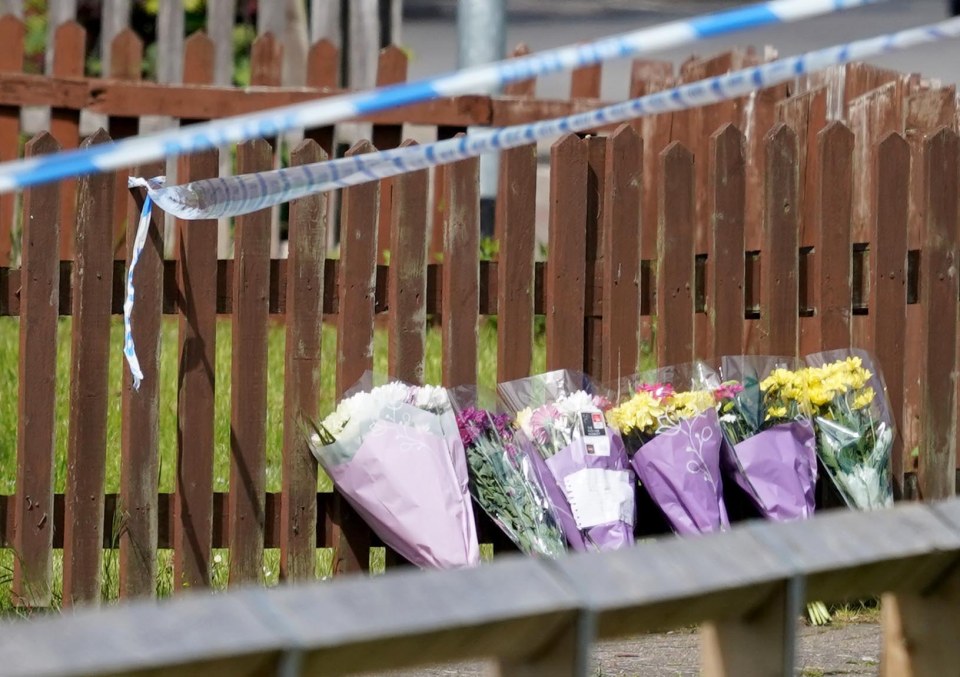 Tributes have been left at the scene in Corby