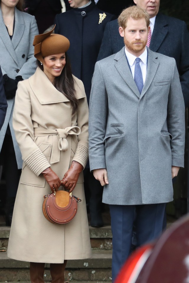 a man and a woman are standing next to each other