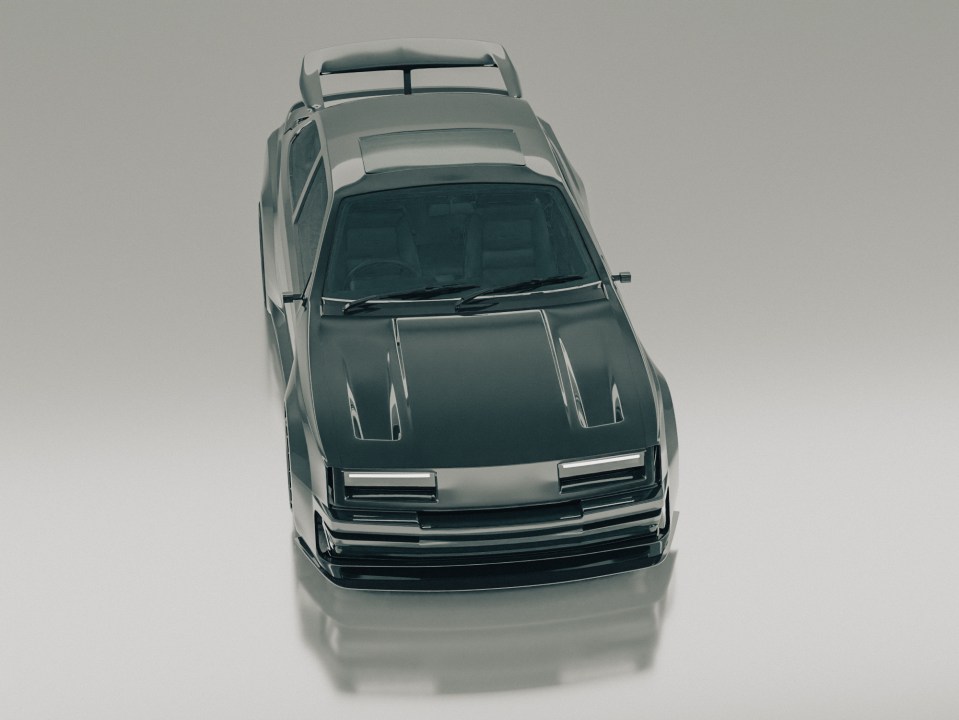 an aerial view of a car with a spoiler on the hood