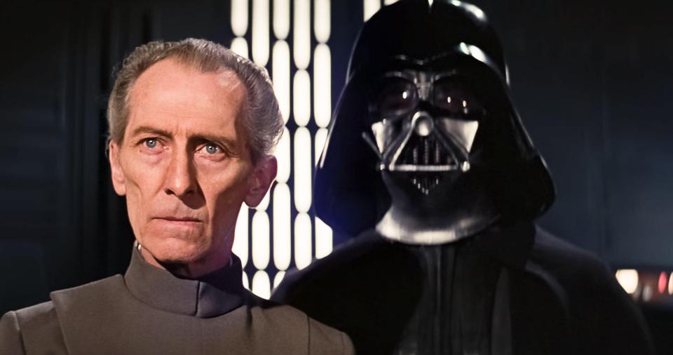a man in a military uniform stands next to darth vader