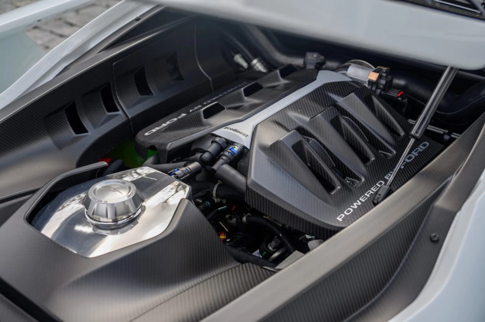 a ford engine is shown with the hood open
