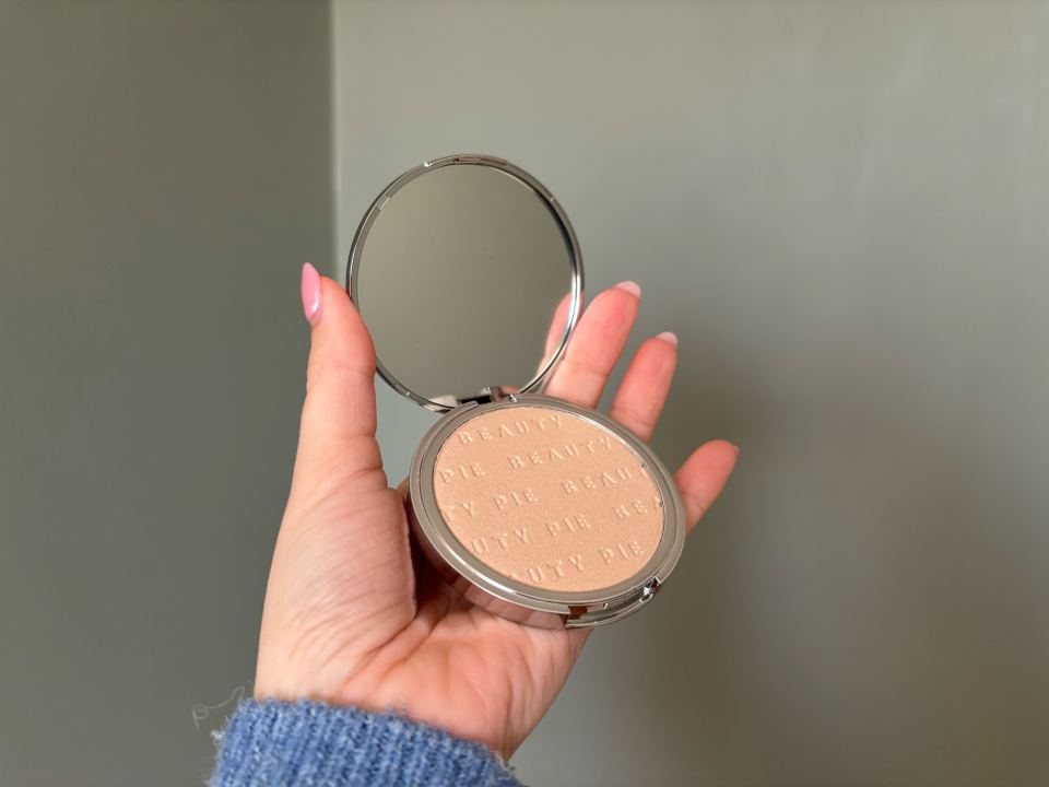 Compact powder with mirror.