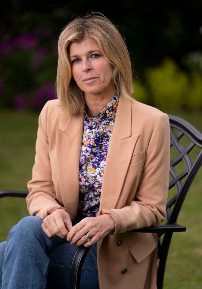 Kate Garraway sitting outdoors.