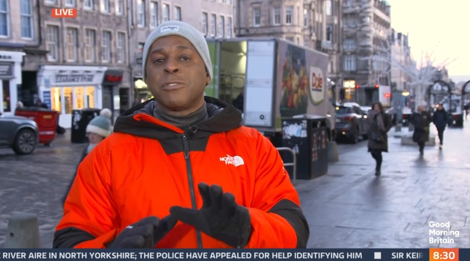 Reporter giving a live report on Good Morning Britain.