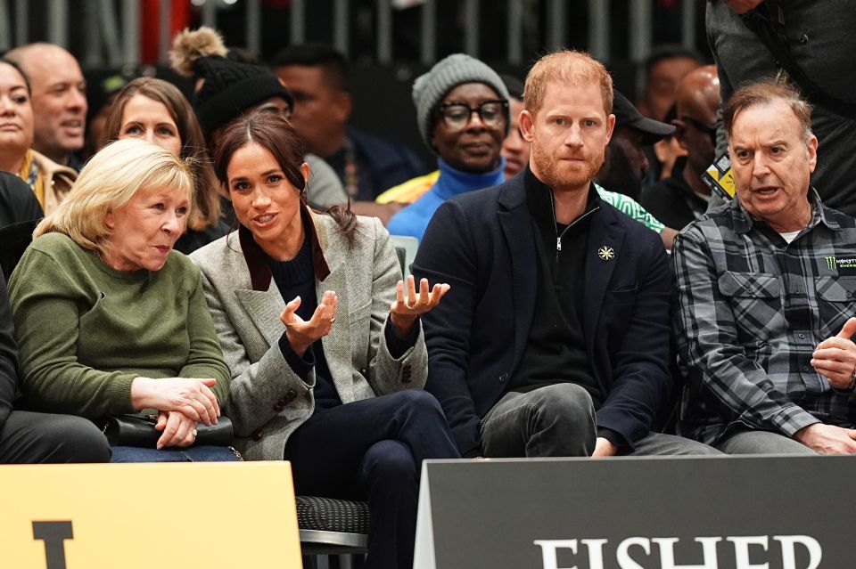 The Duke and Duchess of Sussex at a wheelchair basketball game.