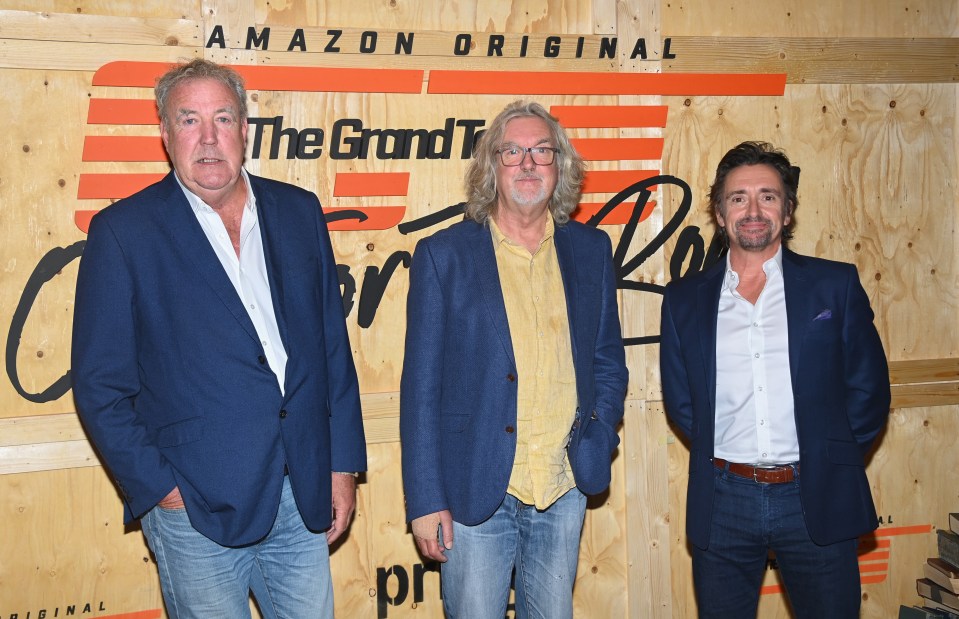 Jeremy Clarkson, James May, and Richard Hammond at a Grand Tour event.
