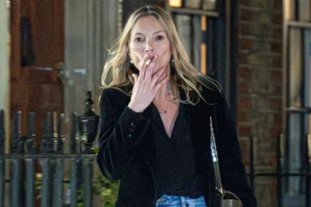 An image collage containing 1 images, Image 1 shows BGUK_3184556 - *PREMIUM-EXCLUSIVE* London, UNITED KINGDOM - * MUST CALL FOR PRICING BEFORE USAGE * *STRICTLY NO SUBSCRIPTIONS AND NO SOCIAL SOCIAL MEDIA USE* - Kate Moss was spotted channelling the spirit of her wild party days as she strolled down the street with a cigarette in one hand and a bottle of Corona beer in the other. The laid-back outing comes just days after her appearance at Paris Fashion Week, where she sparked conversation among fans after being filmed looking tense and tired- at one point even stepping out of a car with makeup smudged across her outfit. In recent years, Kate has been known for embracing a healthier, more wellness-focused lifestyle- reportedly giving up alcohol in 2018 and quitting smoking in 2020, swapping late nights for yoga, meditation, and early mornings. But with beer and fag in hand, she seemed to be tapping back into her free-spirited roots with her latest appearance. The supermodel was seen visiting a friend in central London, looking relaxed and carefree as she enjoyed the outing. *STRICTLY NO SUBSCRIPTIONS AND NO SOCIAL SOCIAL MEDIA USE* Pictured: Kate Moss BACKGRID UK 14 MARCH 2025 UK: +44 208 344 2007 / uksales@backgrid.com USA: +1 310 798 9111 / usasales@backgrid.com *Pictures Containing Children Please Pixelate Face Prior To Publication*