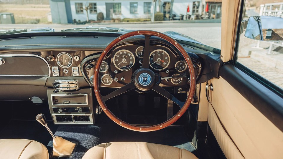 Interior view of a restored 1964 Aston Martin DB5.