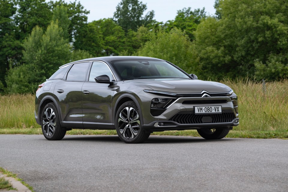 Citroën C5 X PHEV parked on a road.