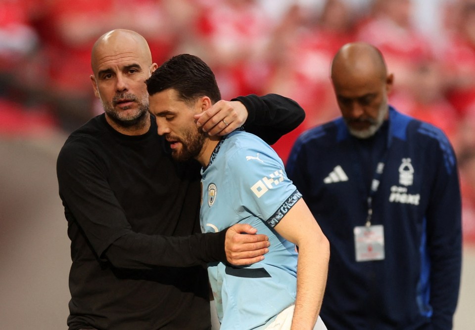 Soccer Football - FA Cup - Semi Final - Nottingham Forest v Manchester City - Wembley Stadium, London, Britain - April 27, 2025 Manchester City manager Pep Guardiola with Mateo Kovacic after he was substituted REUTERS/David Klein
