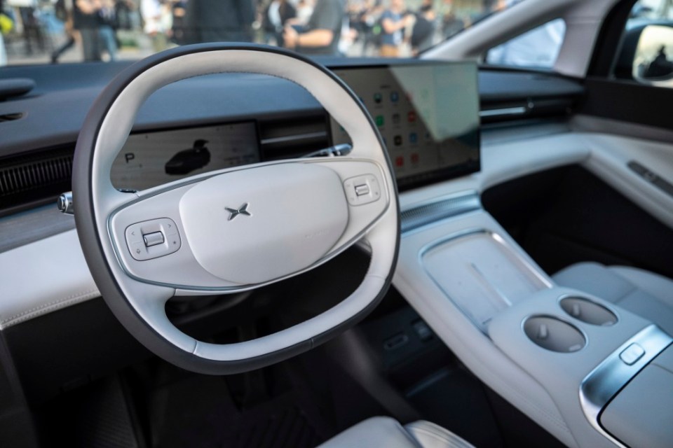 The steering wheel of an XPeng X9 electric vehicle at the company's showcase event in Hong Kong on Tuesday, April 15, 2025. (AP Photo/Chan Long Hei)