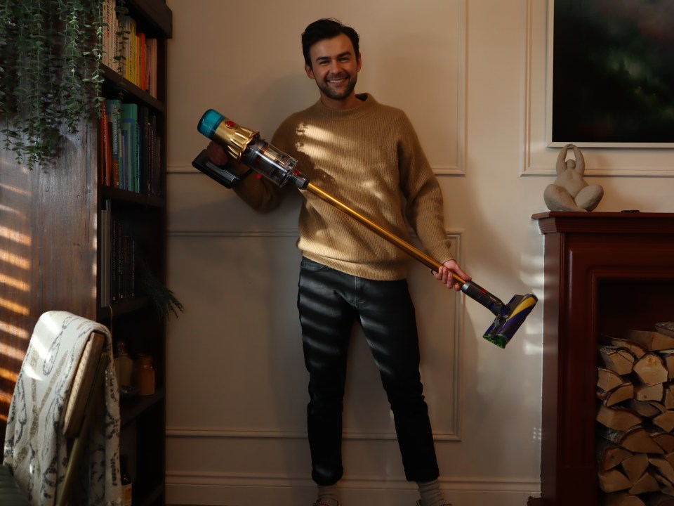 Sun Shopping writer Aaron Dowler holds the Dyson V12