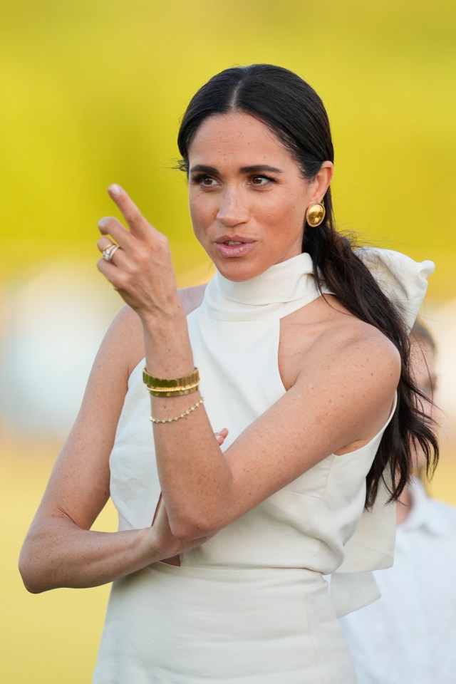 Meghan Markle at a polo match prize ceremony.