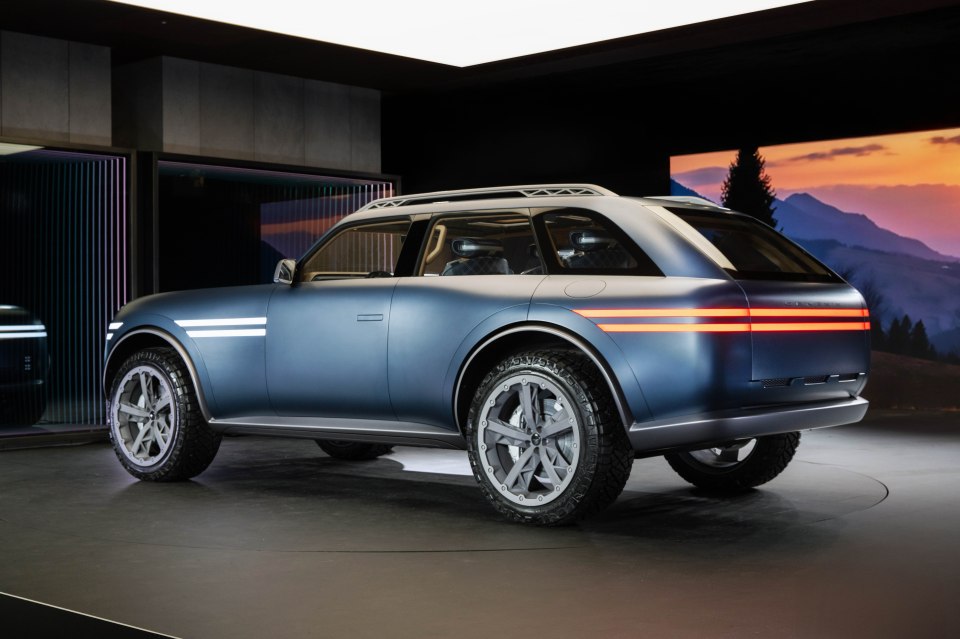 Rear view of a blue Genesis concept SUV.