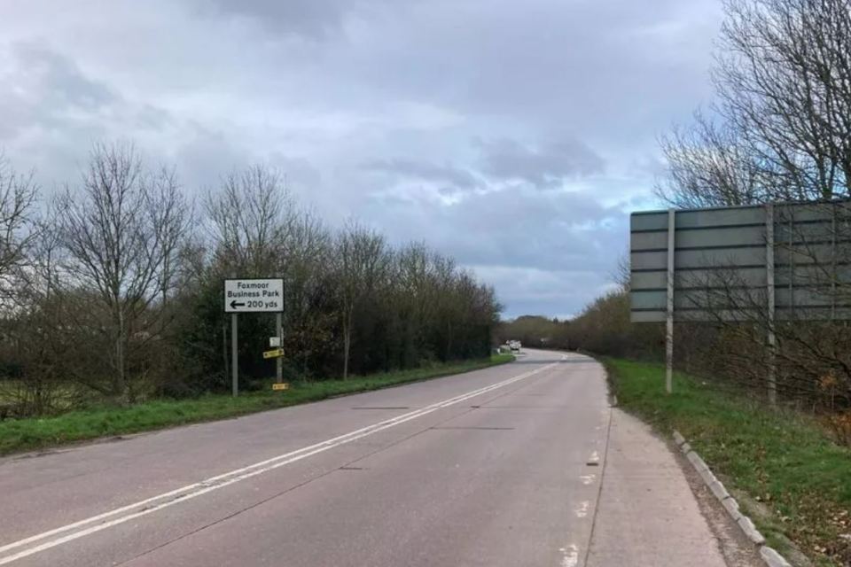 A38 Chelston Link Road with sign for Foxmoor Business Park 200 yards ahead.