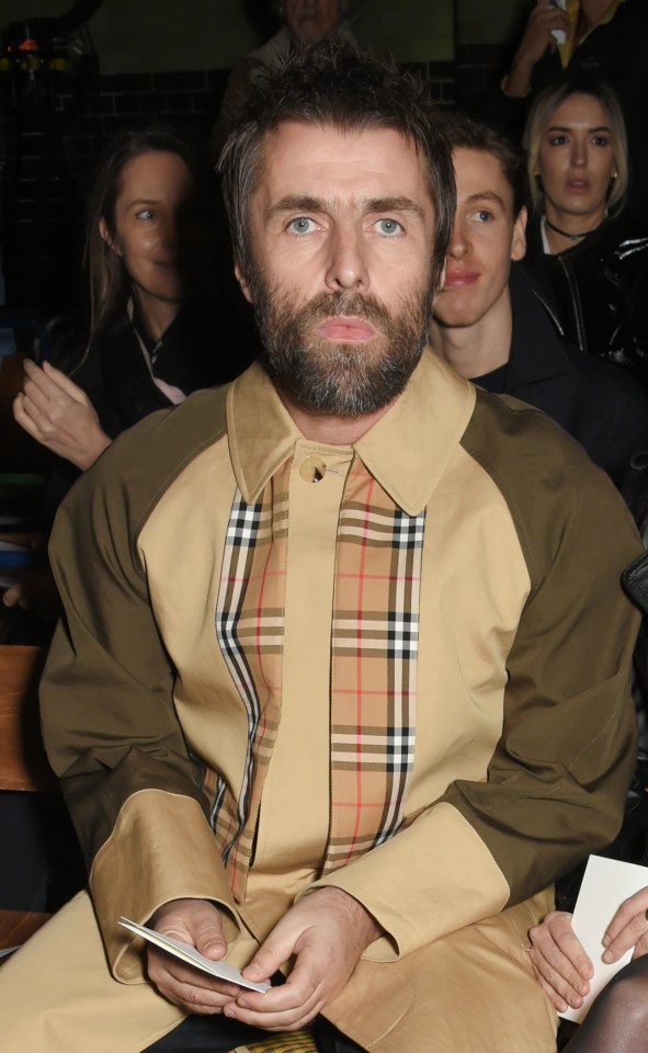 Liam Gallagher at a Burberry fashion show.