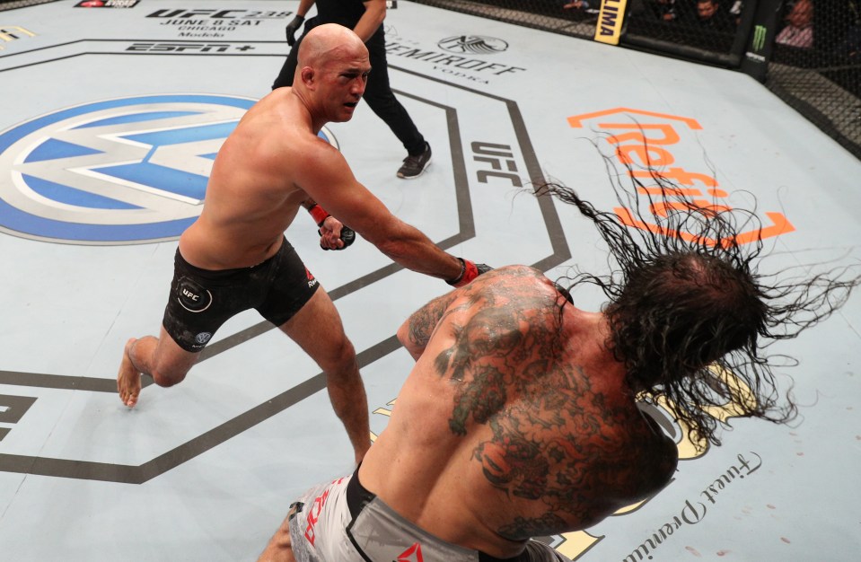 BJ Penn punches Clay Guida in a UFC lightweight bout.
