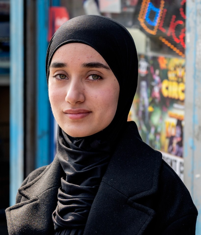 Portrait of a young woman wearing a hijab.