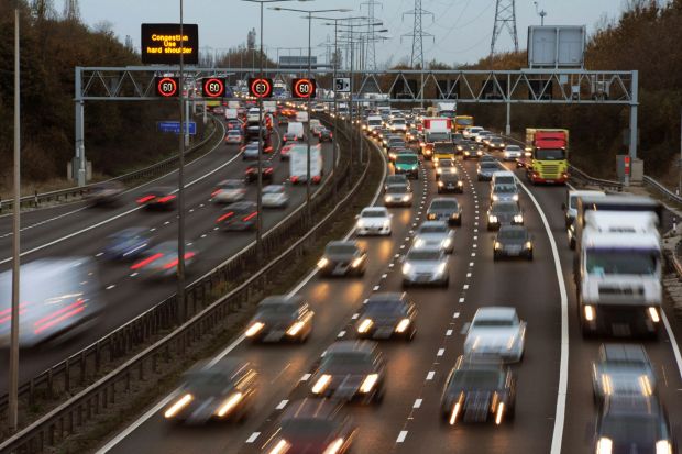 An image collage containing 1 images, Image 1 shows Rush hour traffic on a multi-lane highway