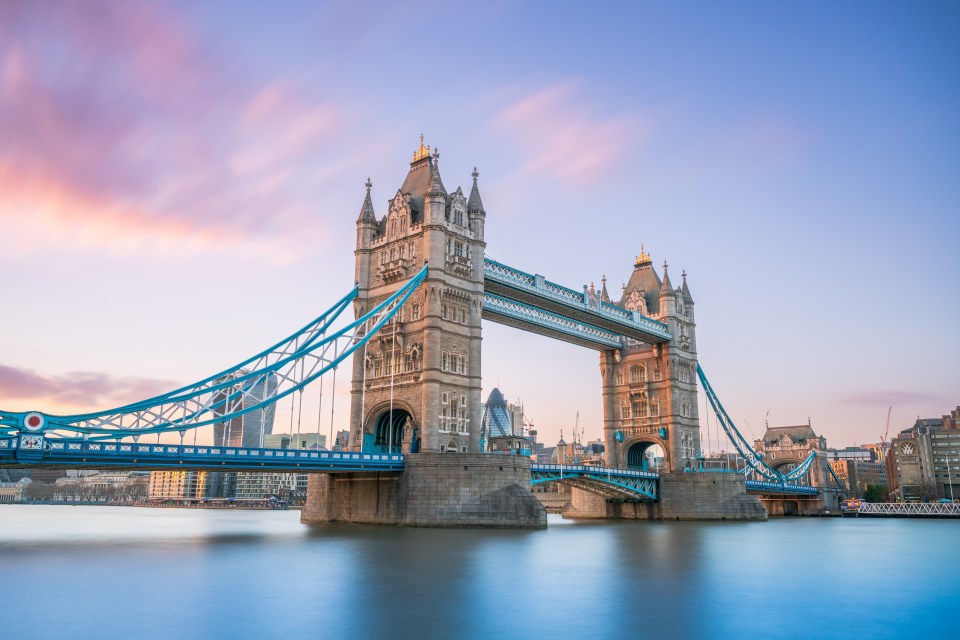 Tower Bridge in London at sunrise.