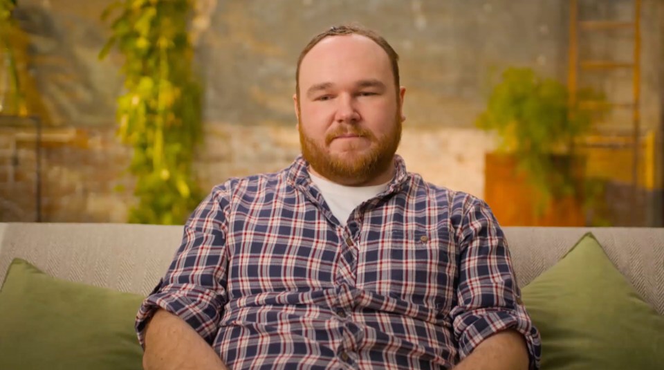 Man sitting on a couch.