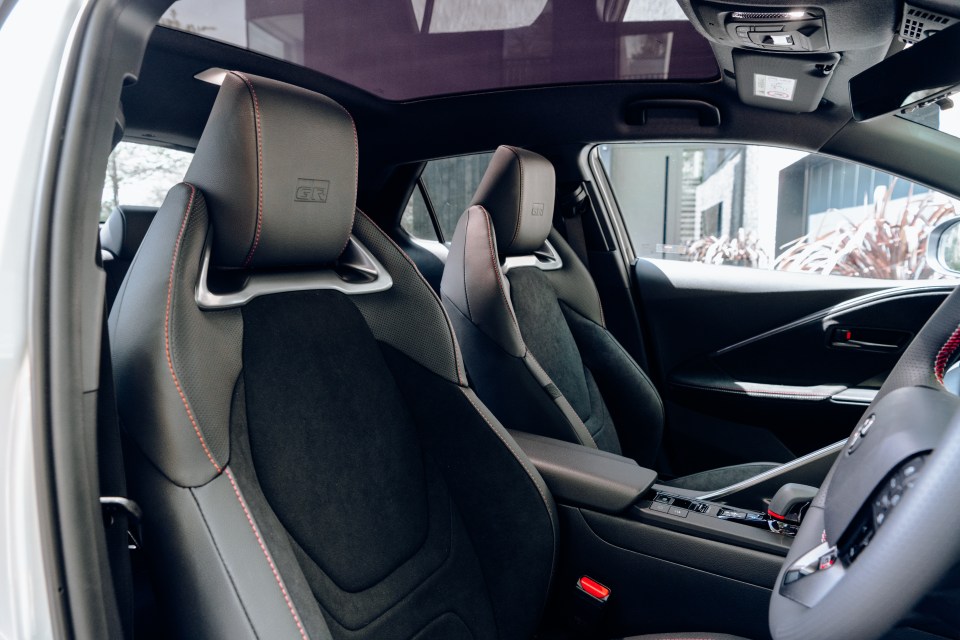Interior view of a Toyota C-HR PHEV GR Sport's front seats.