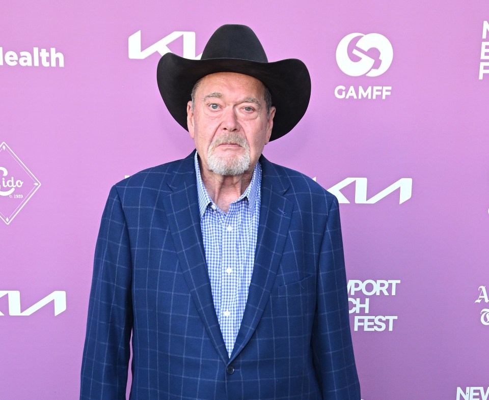 Jim Ross speaking at a podium.