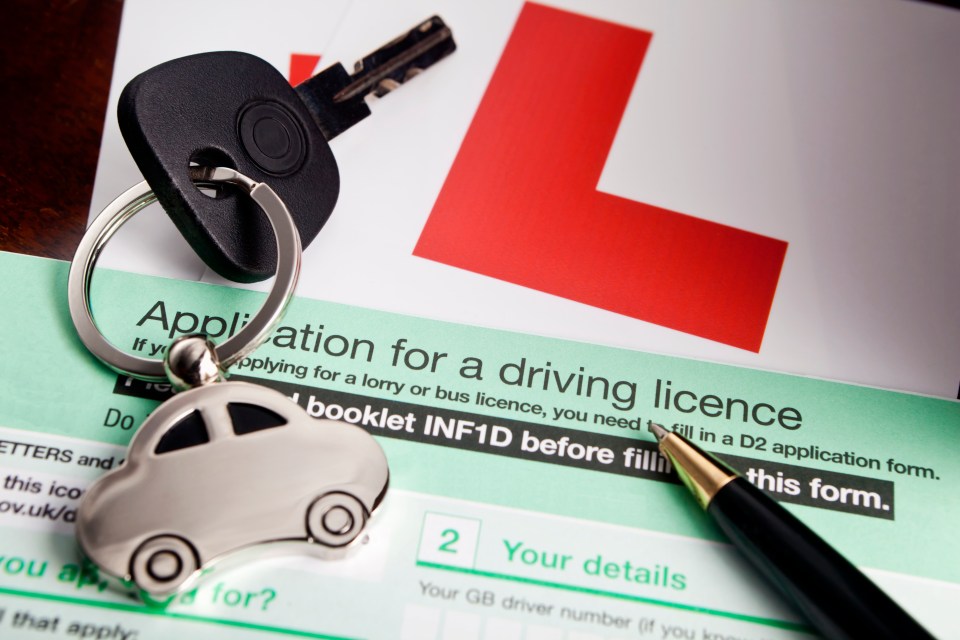 UK driving licence application form with car key and L-plate.