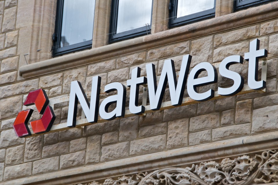 NatWest bank logo on a stone building.