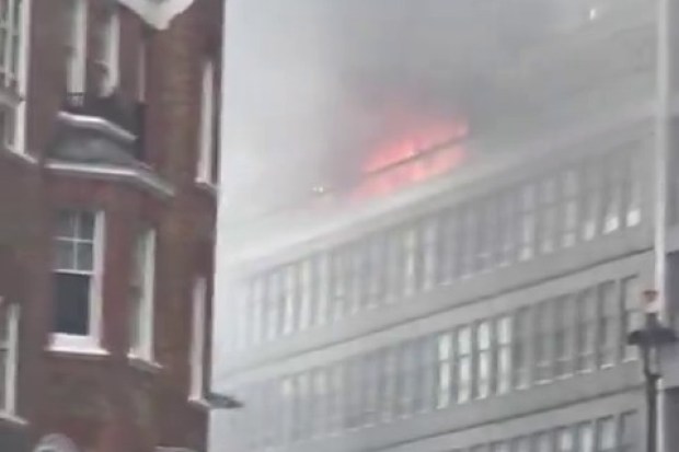 Building fire with smoke.