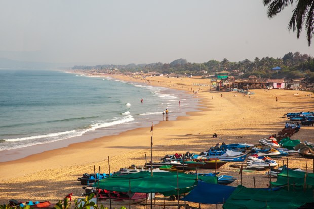 Candolim beach in South Goa, India at sunrise.