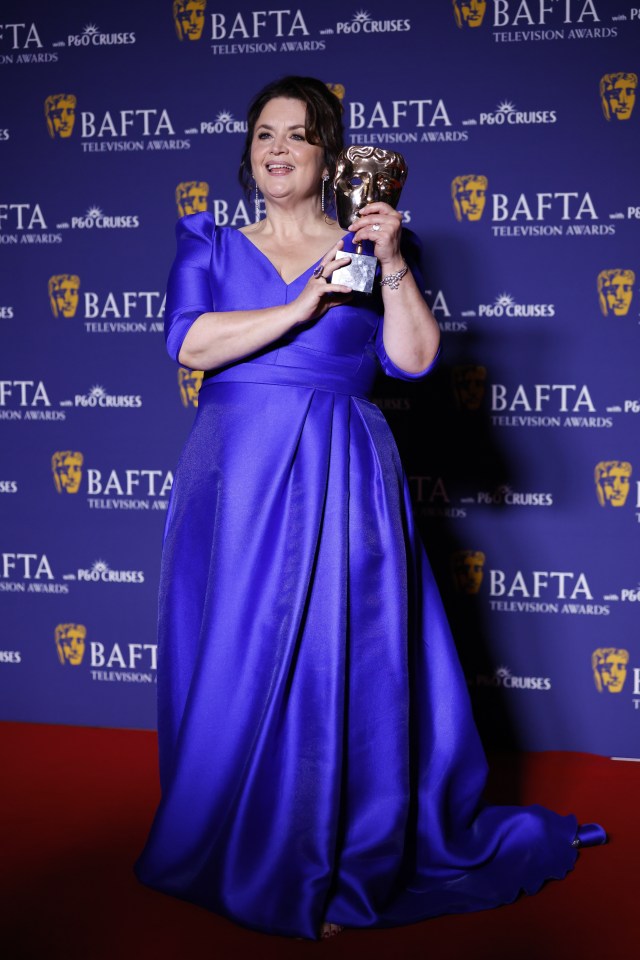 Ruth Jones accepting a BAFTA award.
