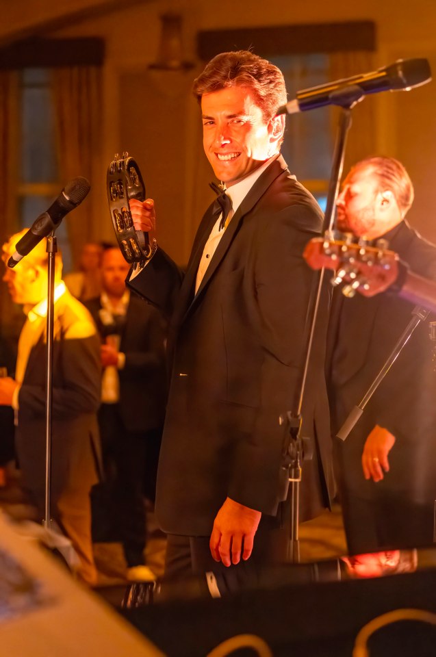 James Argent performing at a charity event.