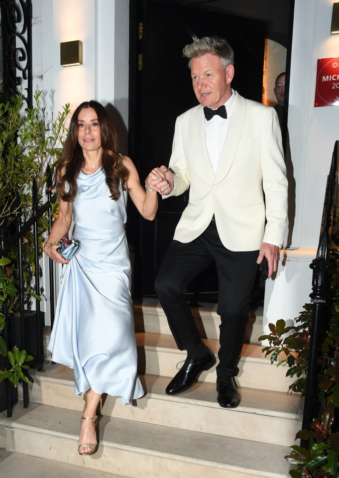 Gordon and Tanya Ramsay leaving a restaurant.