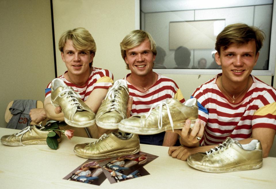 The Herreys brothers, winners of the 1984 Eurovision Song Contest, holding their gold shoes.