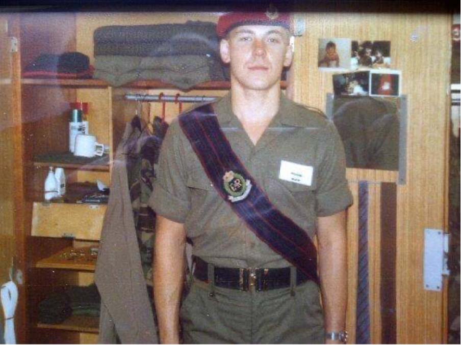 Photo of a soldier in uniform.