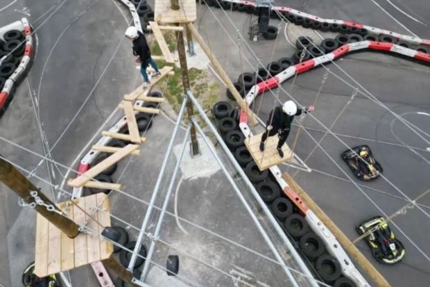 An image collage containing 1 images, Image 1 shows Aerial view of an adventure park high ropes course above a go-kart track