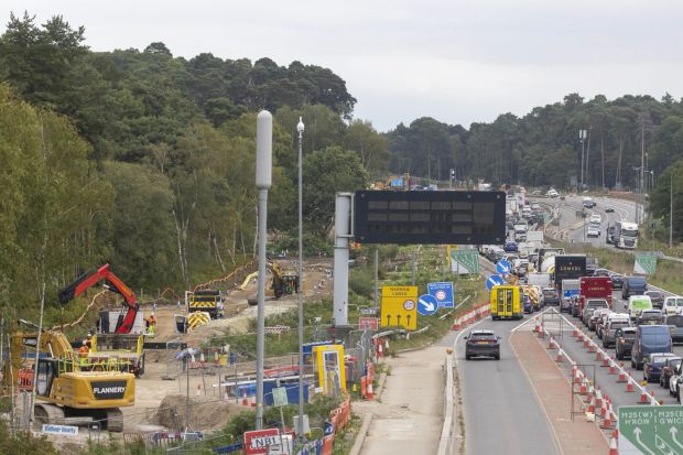 An image collage containing 1 images, Image 1 shows Traffic queue near roadworks on the A3