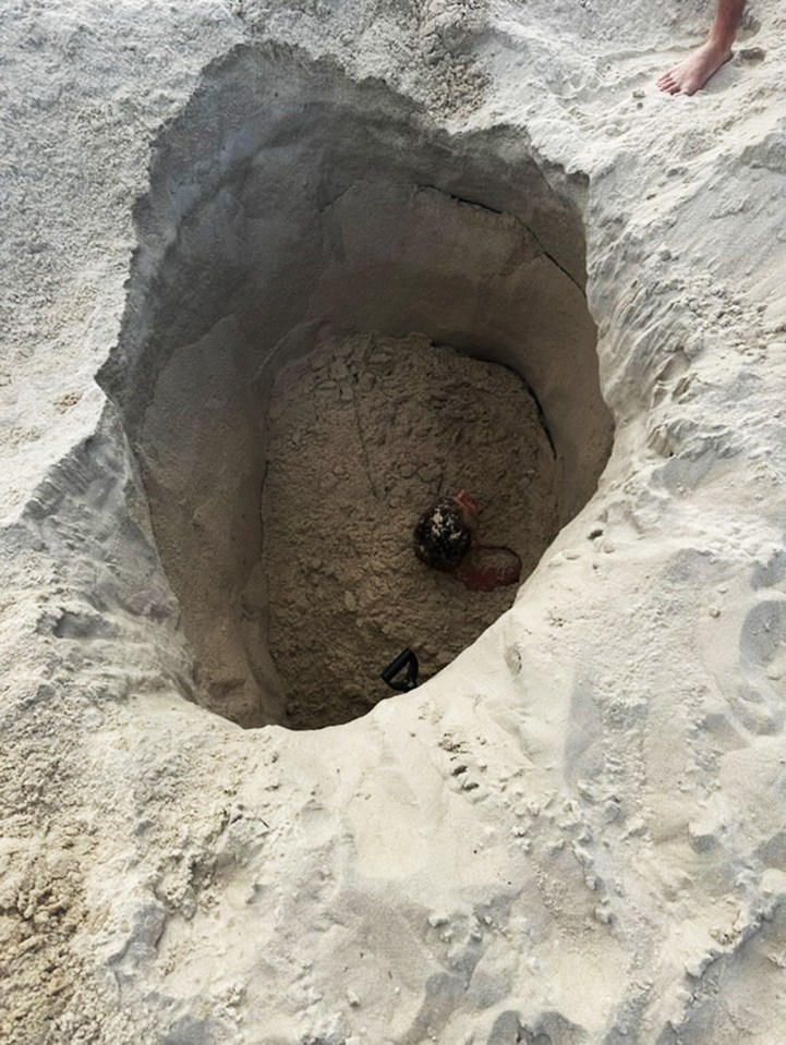 Person rescued from sand pit on Copacabana Beach.