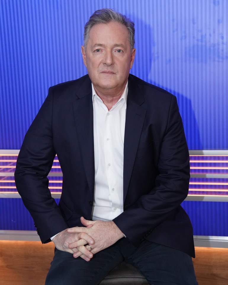 Piers Morgan in a suit during an interview.